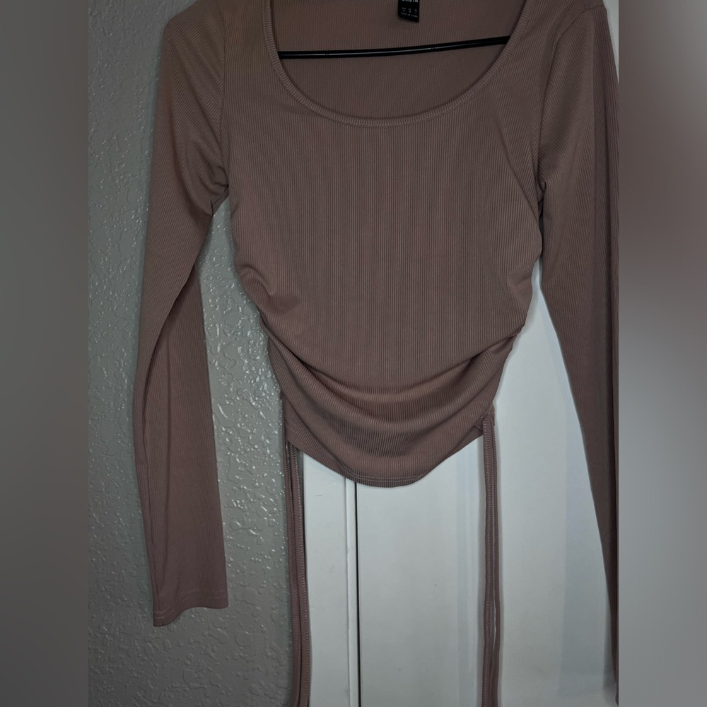 Brown long sleeve top.